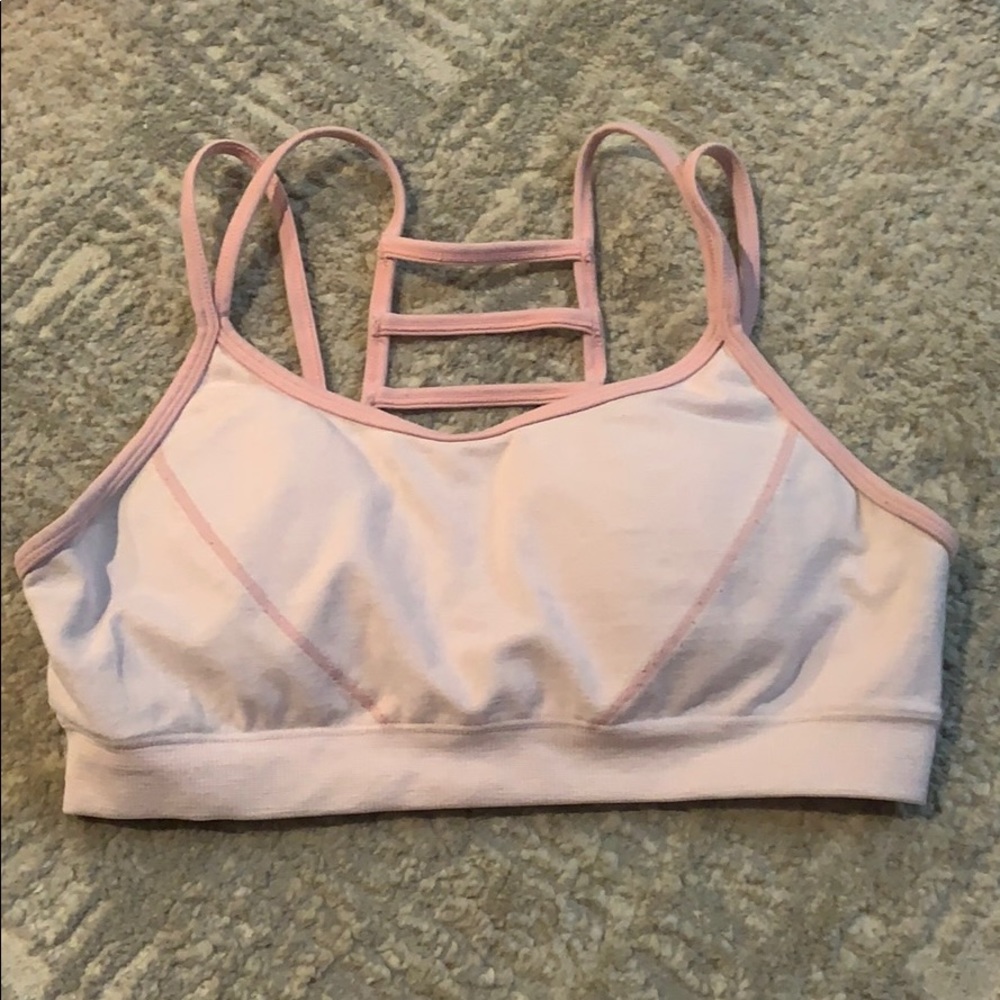 Pink strappy sports bra